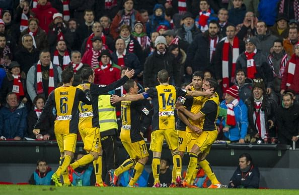 Diego Costa (2ndR) of Atletico de Madrid celebrates after scoring during the Copa del Rey Quarter Final first leg match between Athletic Club de Bilbao.